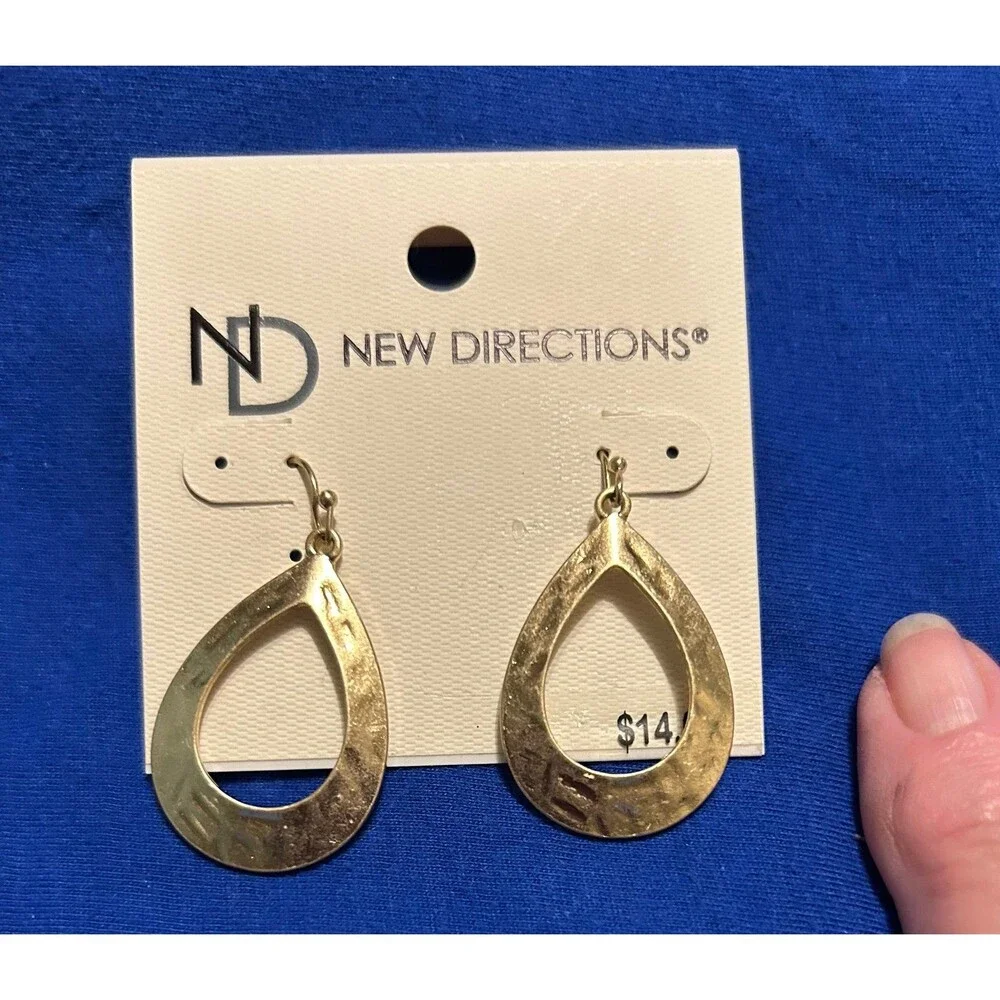 2 pairs of New earrings 1 pair is gold and silver 1 pair is white pearl